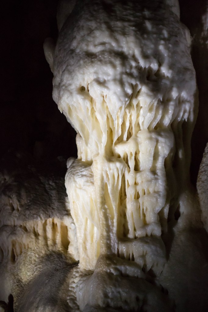 Stalagmites grow mighty from the ground.